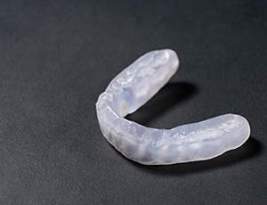 Close-up of nightguard on grey surface