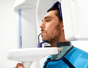 man using CBCT scanner