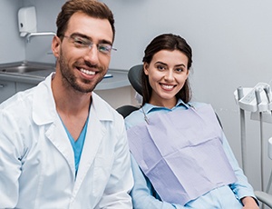 patient smiling with dentist