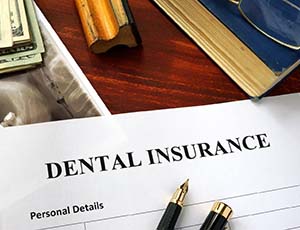 Dental insurance paperwork for the cost of dental emergencies in Plano