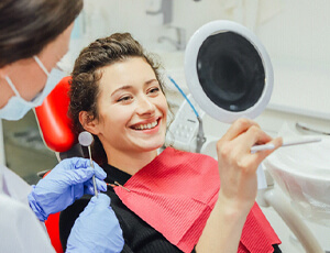 Woman seeing a dentist in Plano