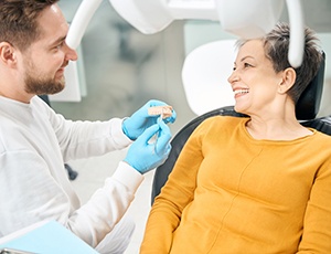 Woman listening to her dentist talk