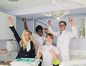 Dental team members happy in the office