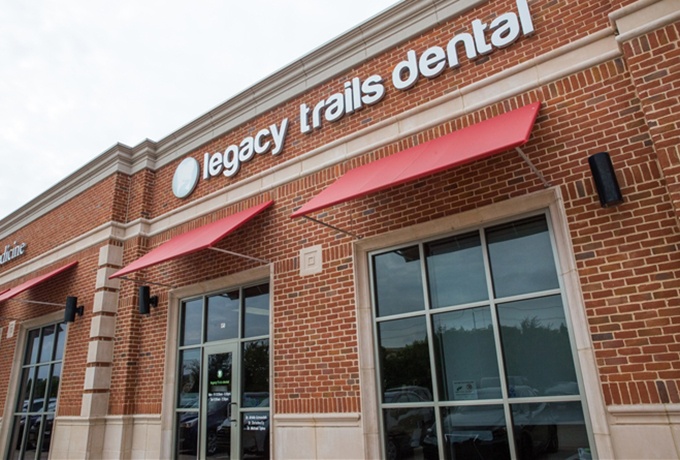 Legacy Trails Dental of Plano sign on office building