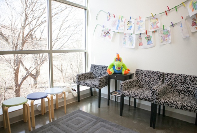 Children's coloring pages on dental office waiting room wall