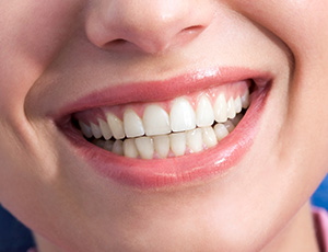 Closeup of healthy teeth and gums after periodontal therapy