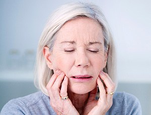 Close-up of senior woman with TMJ disorder in Plano, TX