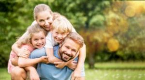 Smiling family in the spring season