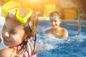 children playing at pool