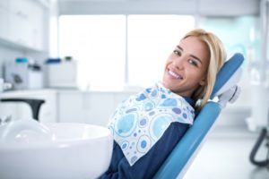 Patient receiving care from dentist in Plano