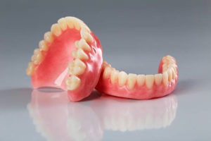 Set of upper and lower denture