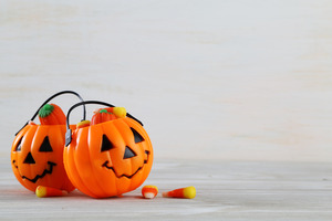 Small Halloween buckets filled with candy